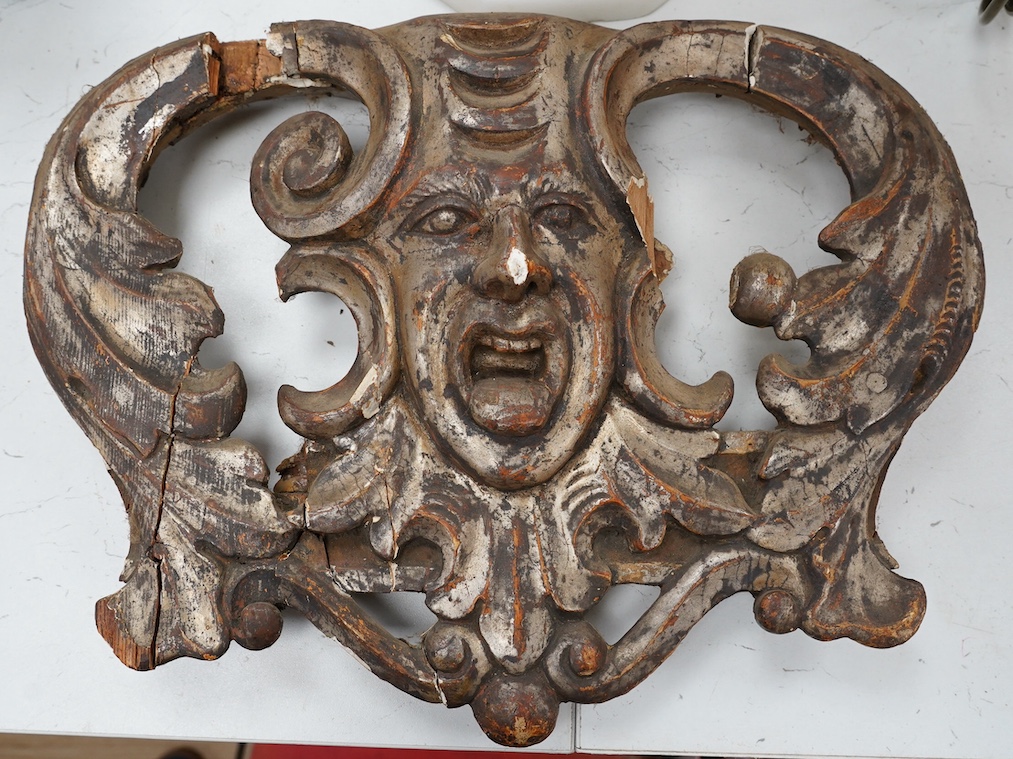 A 19th century silvered wood carving, 38cm wide. Condition - poor